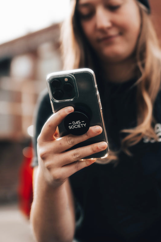 Pop out phone holder
